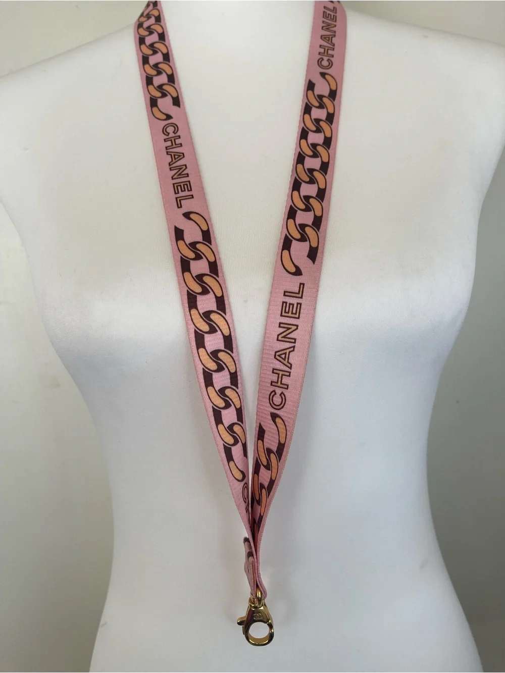 CHANEL Pink Chain-Print Lanyard with Gold Hardware